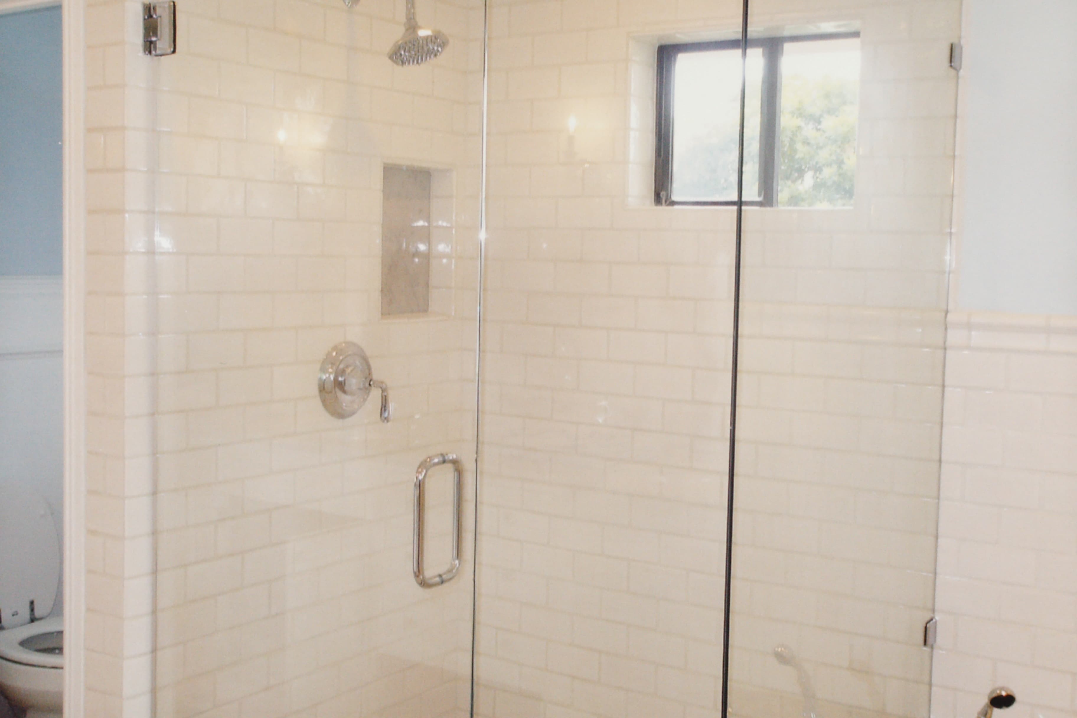 Rain Showerhead & Glass Door Upgrade — after remodel by McClelland Construction
